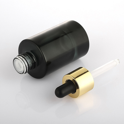 Frasco de suero cosmético personalizado Frasco cuentagotas de hombro plano helado de oro negro