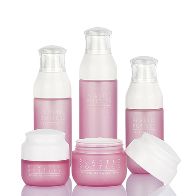 El empaquetado cosmético rosado de lujo del cuidado de la piel fija la loción de la crema de cara embotella 138ml