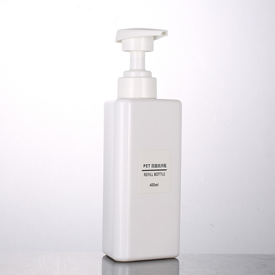 La forma al por mayor del triángulo de 100ml 200ml 300ml recicla las botellas privadas de aire del champú de la bomba 500ml del animal doméstico de la loción del negro plástico del envase