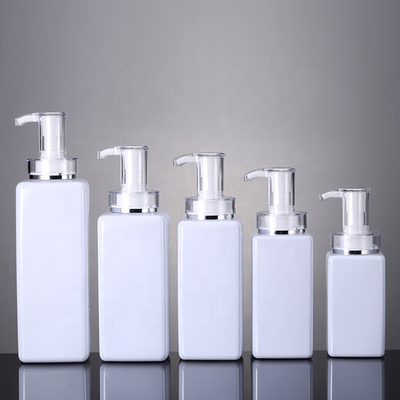 Botella clara del champú del plástico de la loción de 300ml 400ml 500ml del hotel de los hombres vacíos de lujo del acondicionador Packaging16oz con la bomba del oro