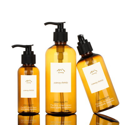 Envases plásticos vacíos de los cosméticos de 200ml 300ml que empaquetan a Amber Shampoo Lotion Pump Bottle de lujo